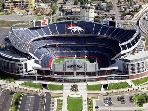 An aerial view of a stadium with many people in it.