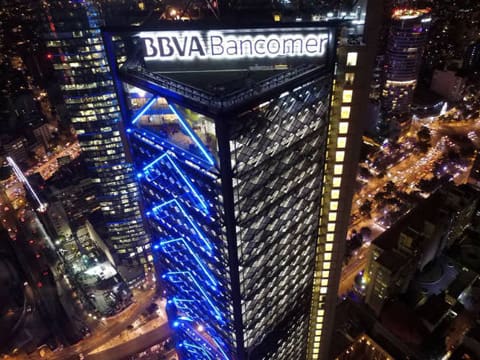 A view of the top of a building at night.